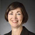 headshot of  Joyce  van der Laan Smith 