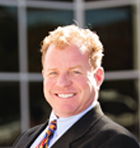 headshot of  Tom  Roberts 